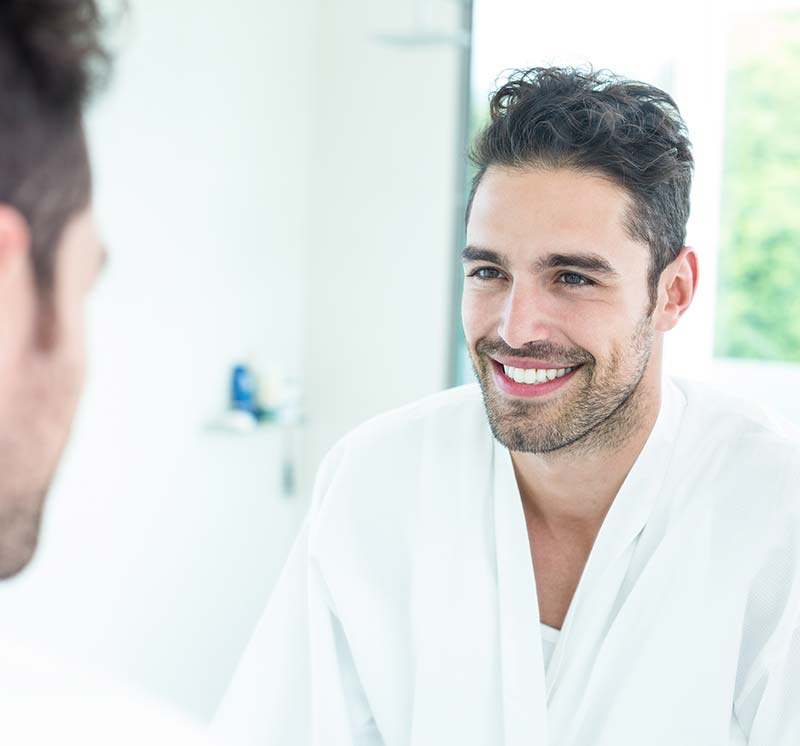 Confident Male Smiling after getting his new smile